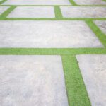 Pattern,Of,Cement,Floor,With,Green,Glass,,Artificial,Grass
